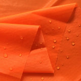 Bright Orange 70 Denier Nylon Ripstop Windsock Fabric DWR  Coated,  60"   $1.25 a  yard